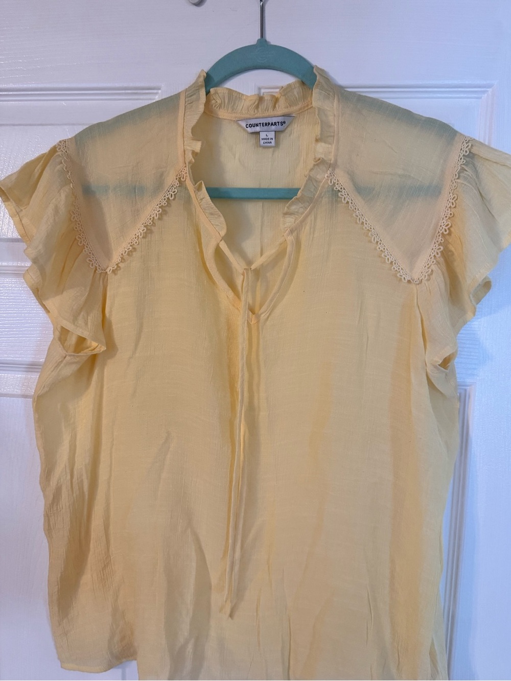 SUMMER SALE!!
Counterparts Pale Yellow Ruffle Cap Sleeve Crocheted Trim Blouse